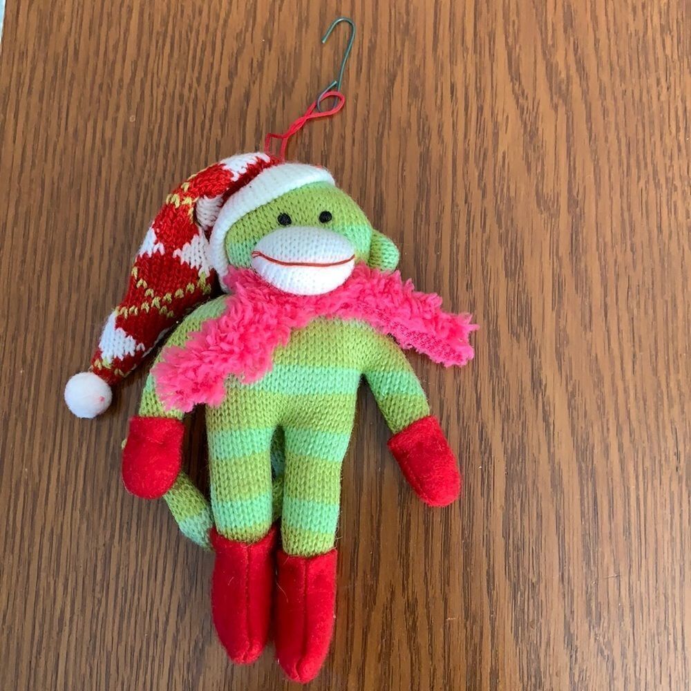 Green knit monkey with stocking‎ cap Christmas tree ornament